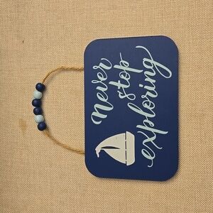 Never stop exploring wood hanging sign
